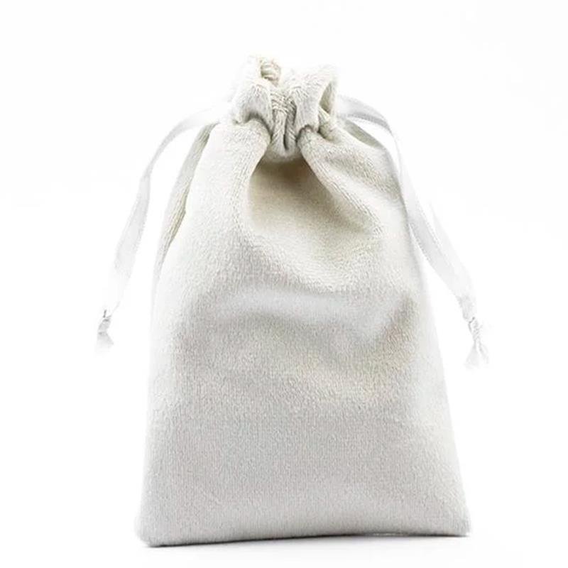  SAQUINHO DE SUEDE BEGE M – PCT COM 10 UNIDADE