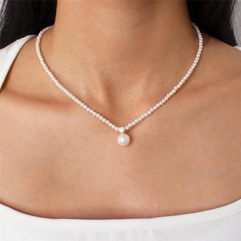 GARGANTILHA FOLHEADA PÉROLA SHELL CORAÇÃO - 42CM