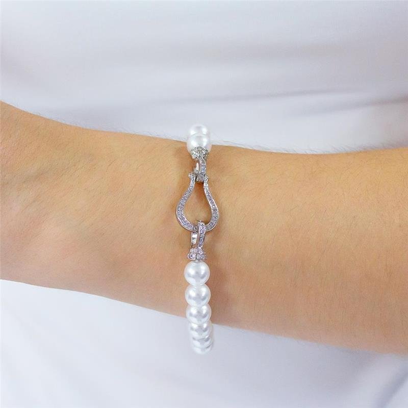 PULSEIRA FOLHEADA PÉROLAS FECHO FERRADURA CRAVEJADO EM RÓDIO